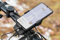 KRUGER & MATZ XT50 Držiak telefónu na bicykel 4v1 so svietidlom a powerbankou