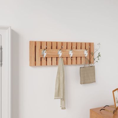 vidaXL Nástenný vešiak 42x8,5x14 cm masívny orech