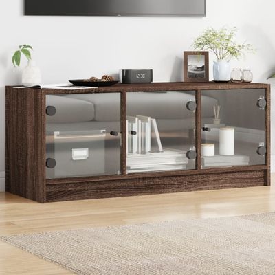 vidaXL TV skrinka so sklenenými dvierkami hnedý dub 102x37x42 cm