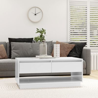 vidaXL Konferenčný stolík, lesklý biely 102,5x55x44cm kompozitné drevo