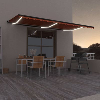 vidaXL Ručne zaťahovacia markíza s LED 600x350 cm oranžová a hnedá