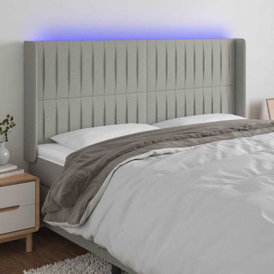 vidaXL Čelo postele s LED bledosivé 163x16x118/128 cm látka