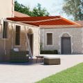 vidaXL Voľne stojaca ručne zaťahovacia markíza 400x300cm oranžovohnedá