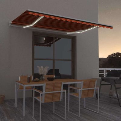 vidaXL Ručne zaťahovacia markíza s LED 400x350 cm oranžová a hnedá