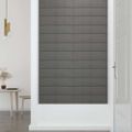 vidaXL Nástenné panely 12 ks bledosivé 60x15 cm látkové 1,08 m²