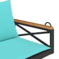 vidaXL Hojdacia lavica s vankúšmi čierna 109x62x40 cm polyratan