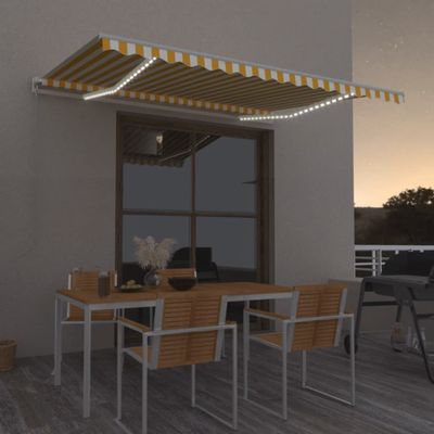 vidaXL Ručne zaťahovacia markíza s LED 450x350 cm žltá a biela