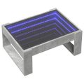 vidaXL Konferenčný stolík s nekonečnými LED betónovosivý 70x53x30 cm