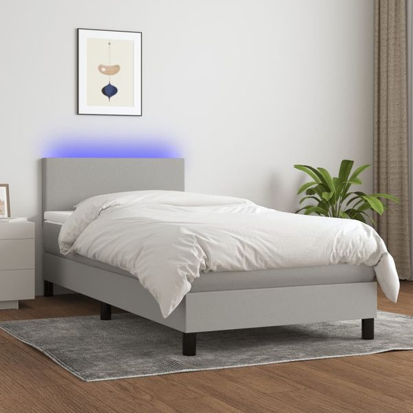 vidaXL Posteľ boxsping s matracom a LED bledosivá 90x200 cm látka