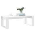 vidaXL Konferenčný stolík lesklý biely 102x50x35 cm kompozitné drevo
