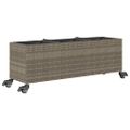 vidaXL Záhradné kvetináče kolieska 2 ks sivé 107x32x38 cm polyratan