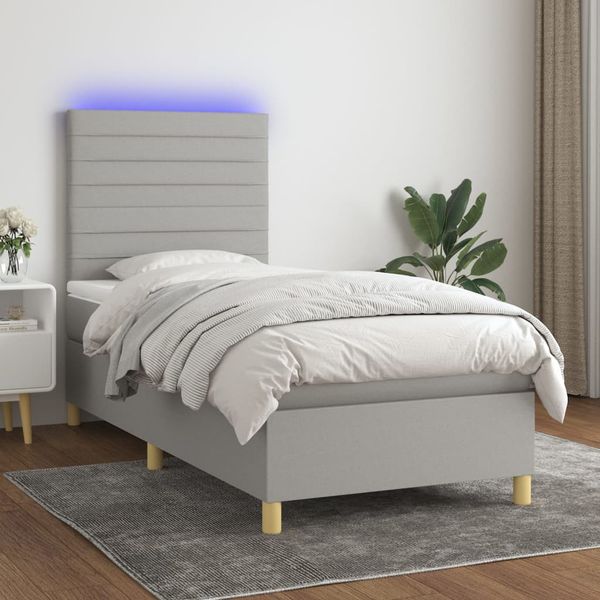 vidaXL Posteľ boxsping s matracom a LED bledosivá 90x190 cm látka