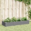 vidaXL Záhradný kvetináč s kolíkmi bledosivý 125x40x28,5 cm PP