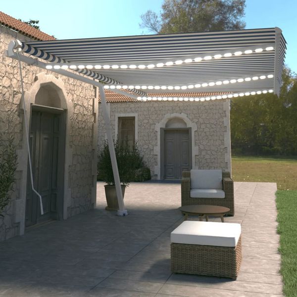vidaXL Ručne zaťahovacia markíza s LED 600x350 cm modrá a biela