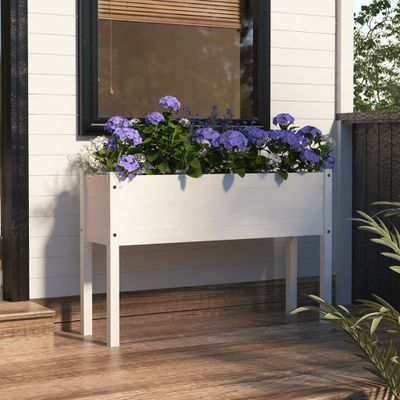 vidaXL Záhradný kvetináč biely 110x31x70 cm borovicový masív
