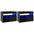 vidaXL TV skrinky s LED svetlami 2 ks lesklé čierne 60x35x40 cm