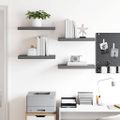 vidaXL Plávajúce nástenné police 4 ks, lesklé sivé 50x23,5x3,8 cm, MDF