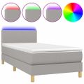 vidaXL Posteľ boxsping s matracom a LED bledosivá 90x190 cm látka