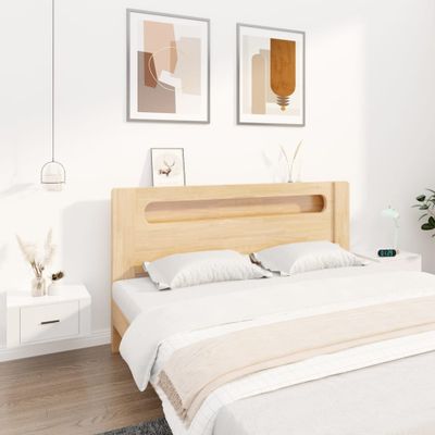 vidaXL Nástenné nočné stolíky 2 ks lesklé biele 50x36x25 cm