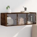 vidaXL Bočná skrinka so sklenenými dvierkami dymový dub 102x37x35 cm
