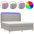 vidaXL Posteľ boxsping s matracom a LED bledosivá 160x200 cm látka
