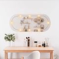 vidaXL Nástenné zrkadlo s LED svetlami 25x60 cm sklo oválne