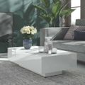 vidaXL Konferenčný stolík lesklý biely 100x49,5x31 cm kompozitné drevo