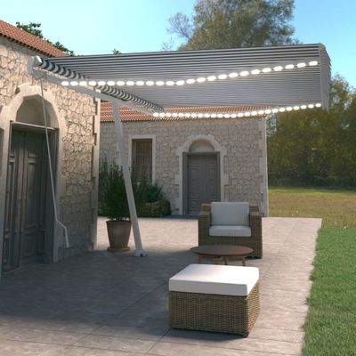vidaXL Ručne zaťahovacia markíza s LED 500x350 cm modrá a biela