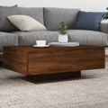 vidaXL Konferenčný stolík s LED svetlami hnedý dub 85x55x31 cm