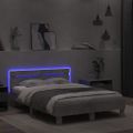 vidaXL Posteľný rám s čelom a LED betónovo sivý 135x190 cm