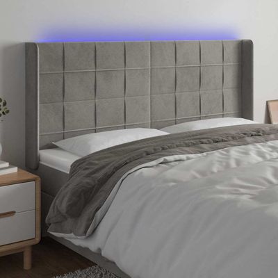 vidaXL Čelo postele s LED bledosivé 183x16x118/128 cm zamat