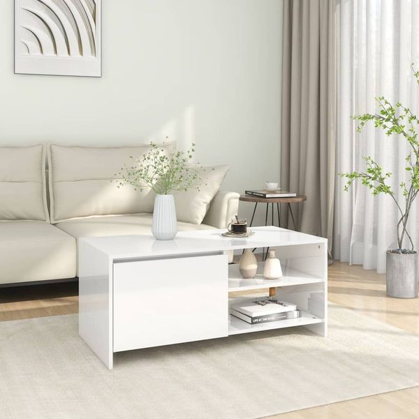 vidaXL Konferenčný stolík lesklý biely 102x50x45 cm spracované drevo