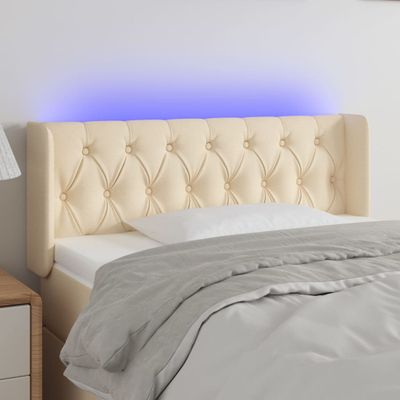 vidaXL Čelo postele s LED krémové 103x16x78/88 cm látka