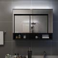 vidaXL LED kúpeľňová zrkadlová skrinka čierna 80x15x60 cm MDF