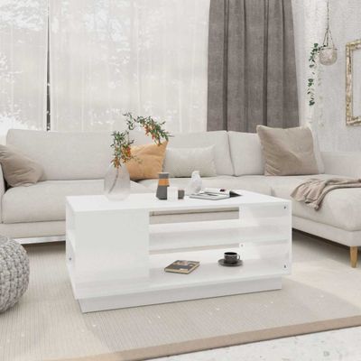 vidaXL Konferenčný stolík, lesklý biely 102x55x43 cm, kompozitné drevo