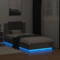 vidaXL Posteľný rám s čelom a LED svetlami betónovo sivý 90x190 cm