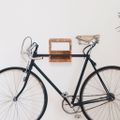 vidaXL Nástenný držiak na bicykel 35x25x25 cm akáciový masív