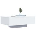 vidaXL Konferenčný stolík s LED svetlami biely 85x55x31 cm