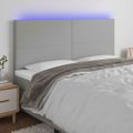 vidaXL Čelo postele s LED bledosivé 160x5x118/128 cm látka