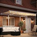 vidaXL Ručne zaťahovacia markíza s LED 3,5x2,5 m žlto-biela