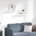 vidaXL Plávajúce nástenné police 2 ks, lesklé biele 50x23,5x3,8 cm, MDF
