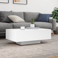 vidaXL Konferenčný stolík s LED svetlami biely 85x55x31 cm