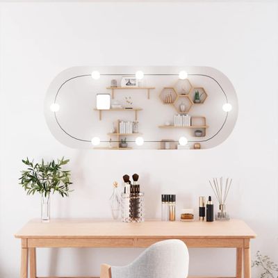 vidaXL Nástenné zrkadlo s LED svetlami 25x60 cm sklo oválne