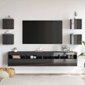vidaXL Nástenné TV skrinky 4 ks lesklé sivé 30,5x30x30 cm