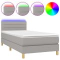 vidaXL Posteľ boxsping s matracom a LED bledosivá 90x190 cm látka