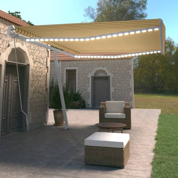 vidaXL Ručne zaťahovacia markíza s LED 500x350 cm žltá a biela