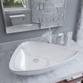 vidaXL Keramické umývadlo biele 645x455x115 mm trojuholníkové