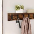 vidaXL Vešiak na stenu Nástenná montáž Dymová dub 60 x 10,5 x 10,5 cm