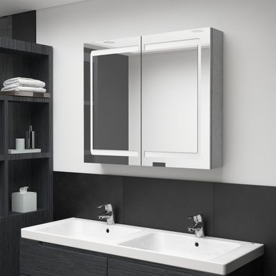 vidaXL LED kúpeľňová zrkadlová skrinka betónovosivá 80x12x68 cm