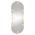 vidaXL Nástenné zrkadlo s LED svetlami 45x100 cm sklo oválne